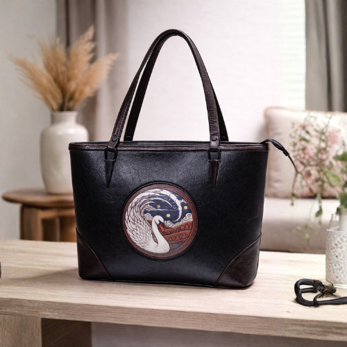 Elegant Black Leather Swan Motif Tote Bag